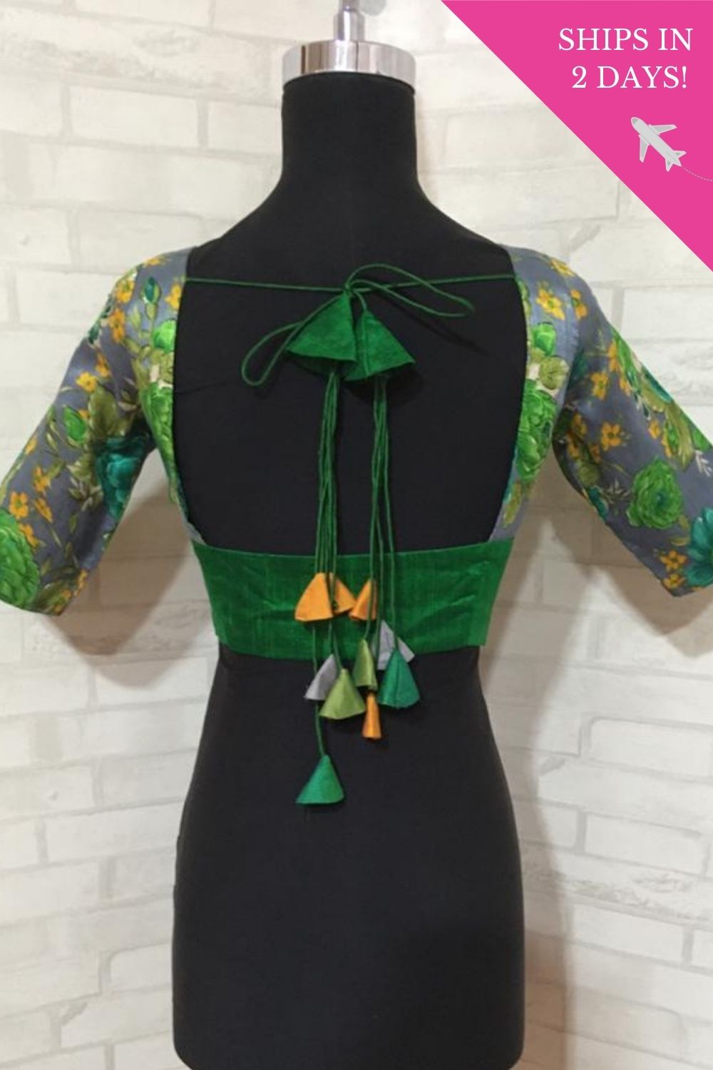 Emerald green raw silk sleeveless blouse with applique on back