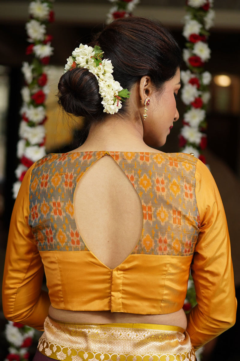 Mustard silk boatneck blouse with pure rawsilk ikkat yoke