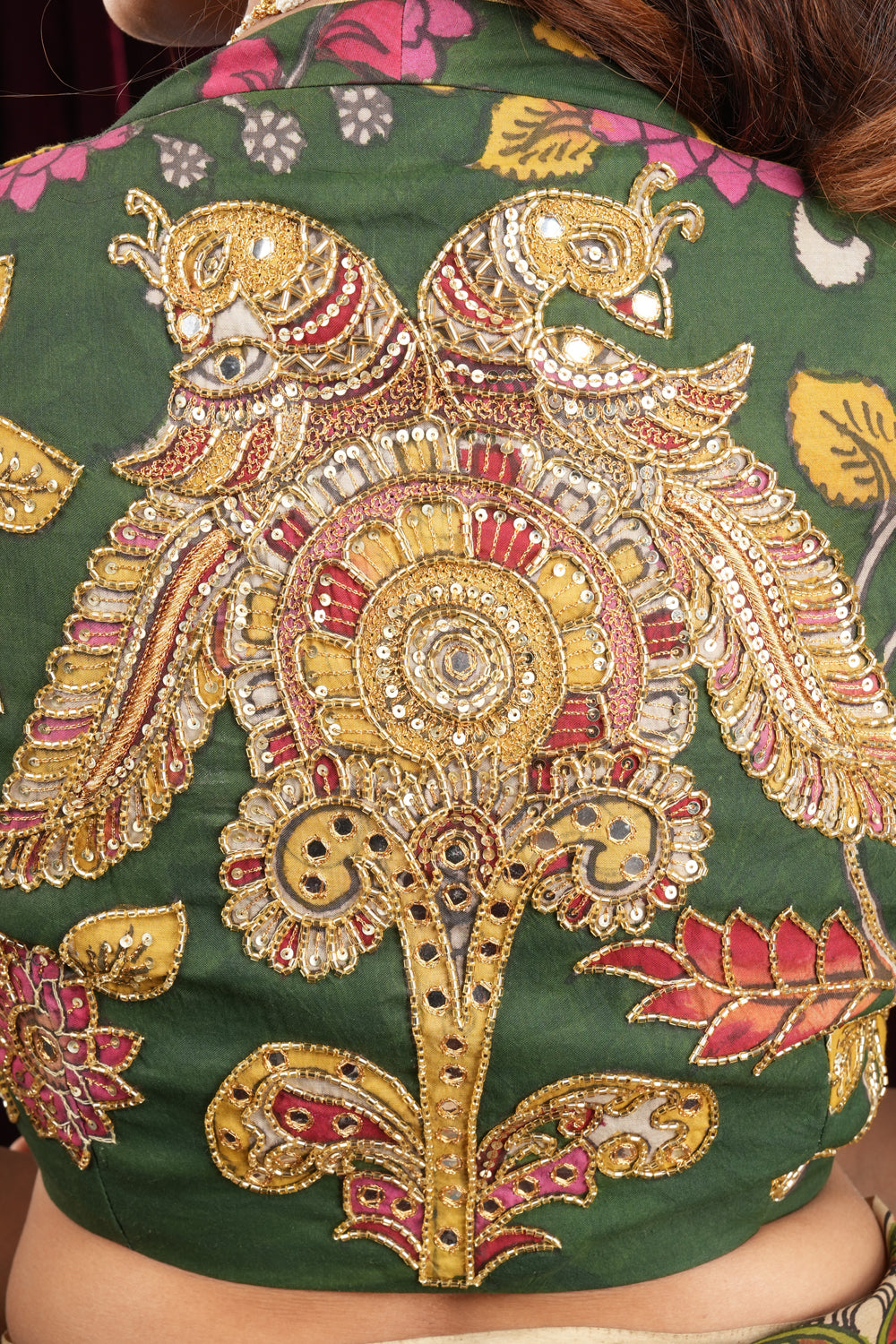 Pure Pen Kalamkari Blouse in olive green with peacock motifs and cutdana sequin hand work