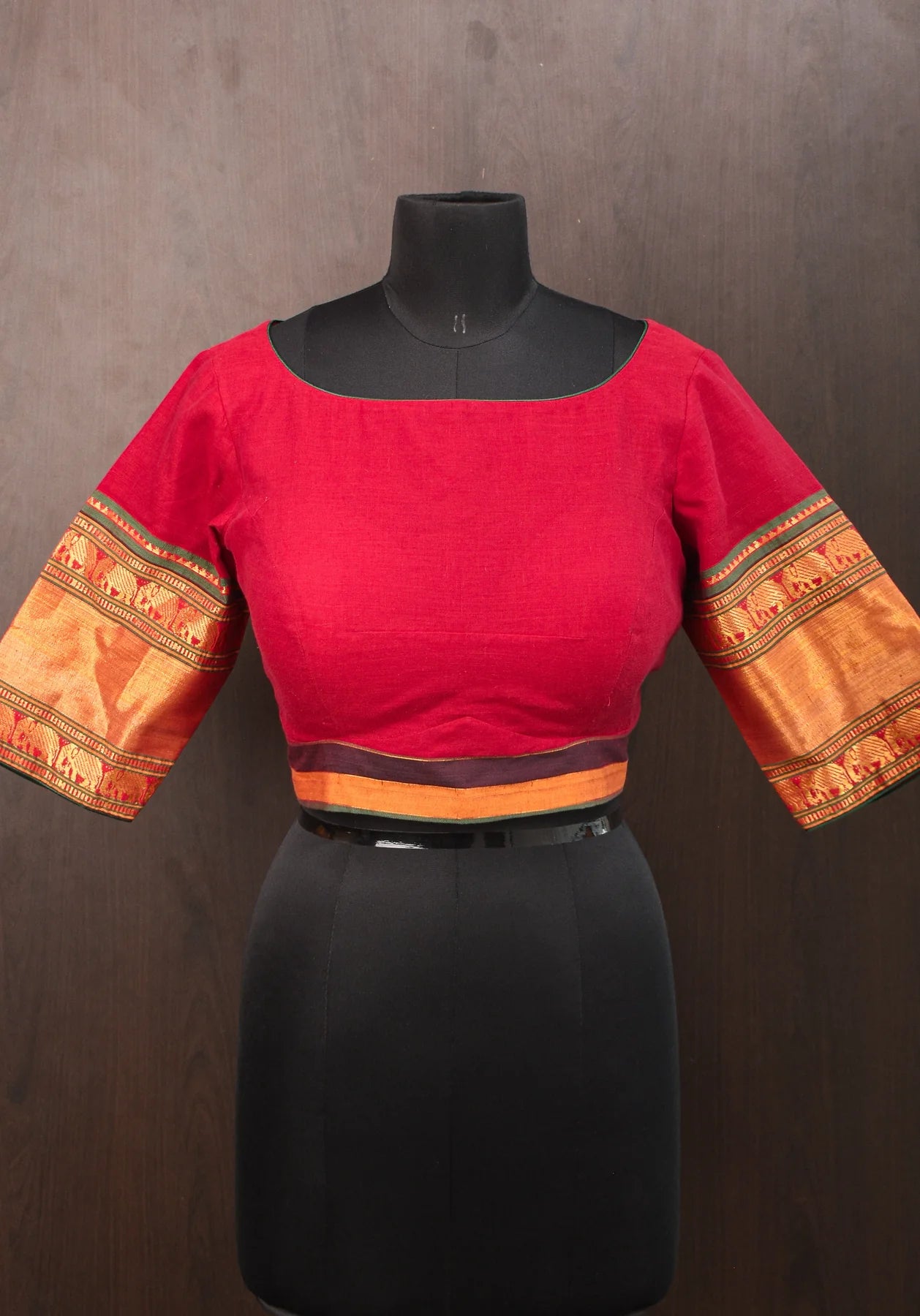 Maroon Narayanpet cotton boatneck blouse with oval cutout and tieback design