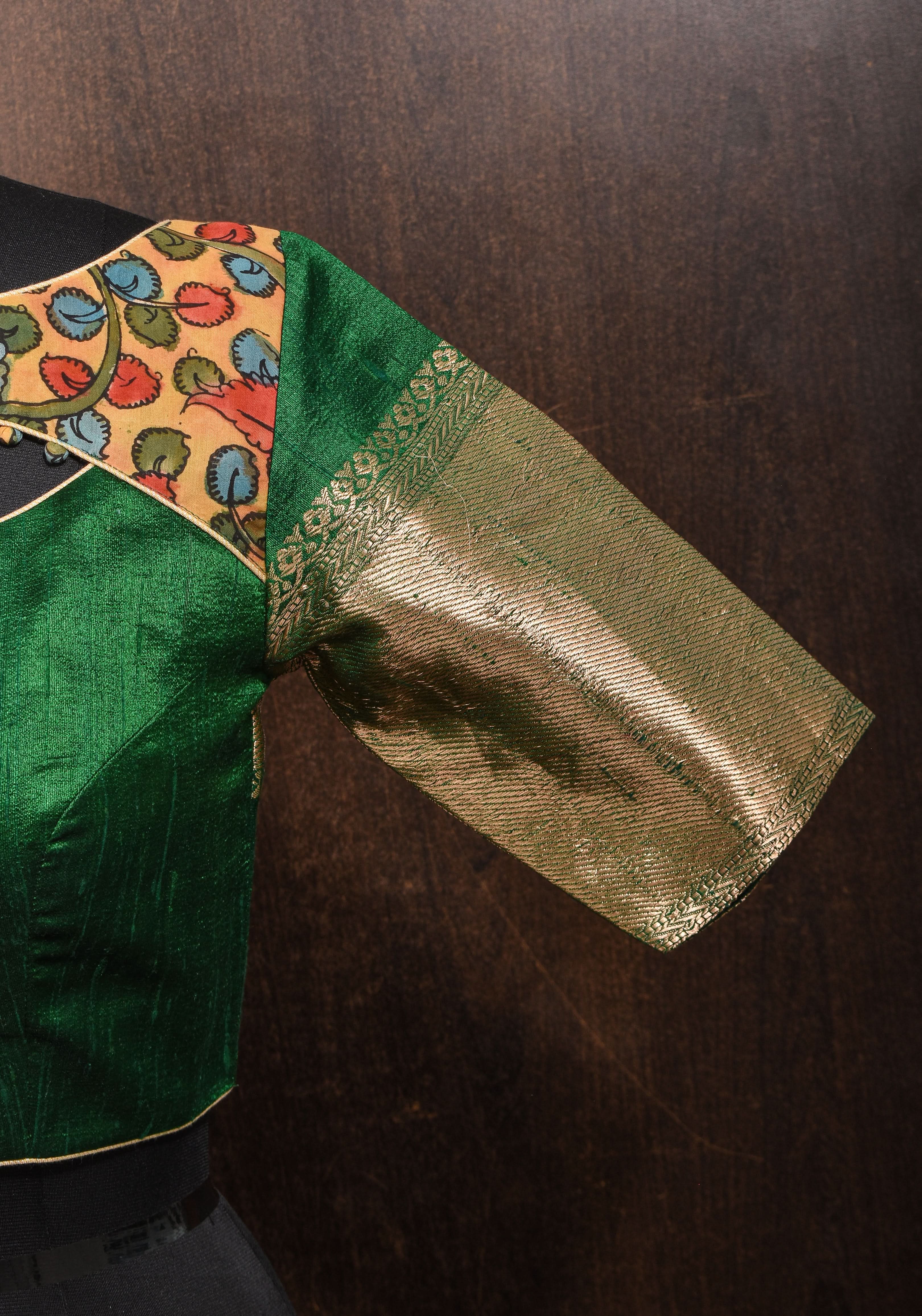 Pure Raw Silk Blouse in Emerlad Green with Kalamkari Yoke Cutout pattern