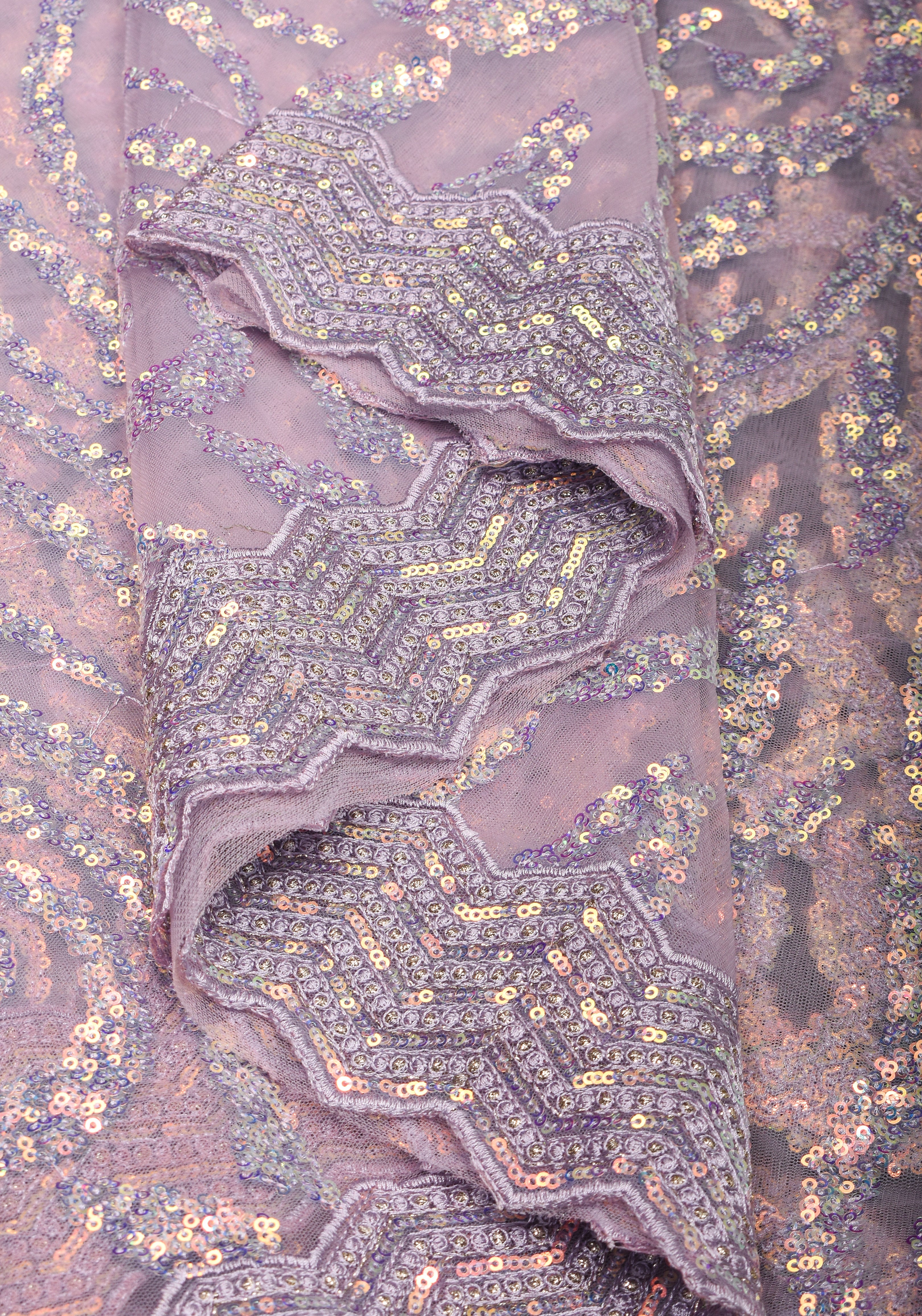 Swirls Design Dusty Pastel lavender Net Saree with sequins
