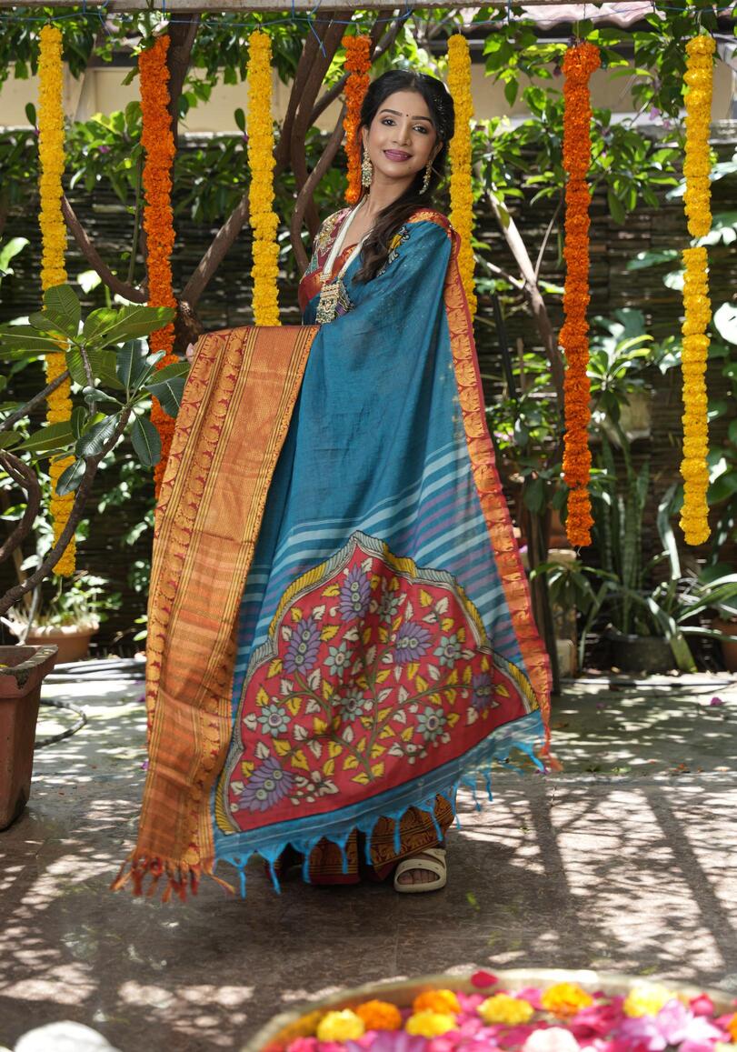 Peacock blue Narayanpet saree with pen kalamkari appliqué and wide zari borders