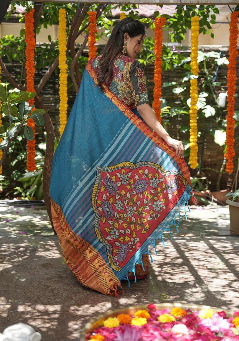 Peacock blue Narayanpet saree with pen kalamkari appliqué and wide zari borders