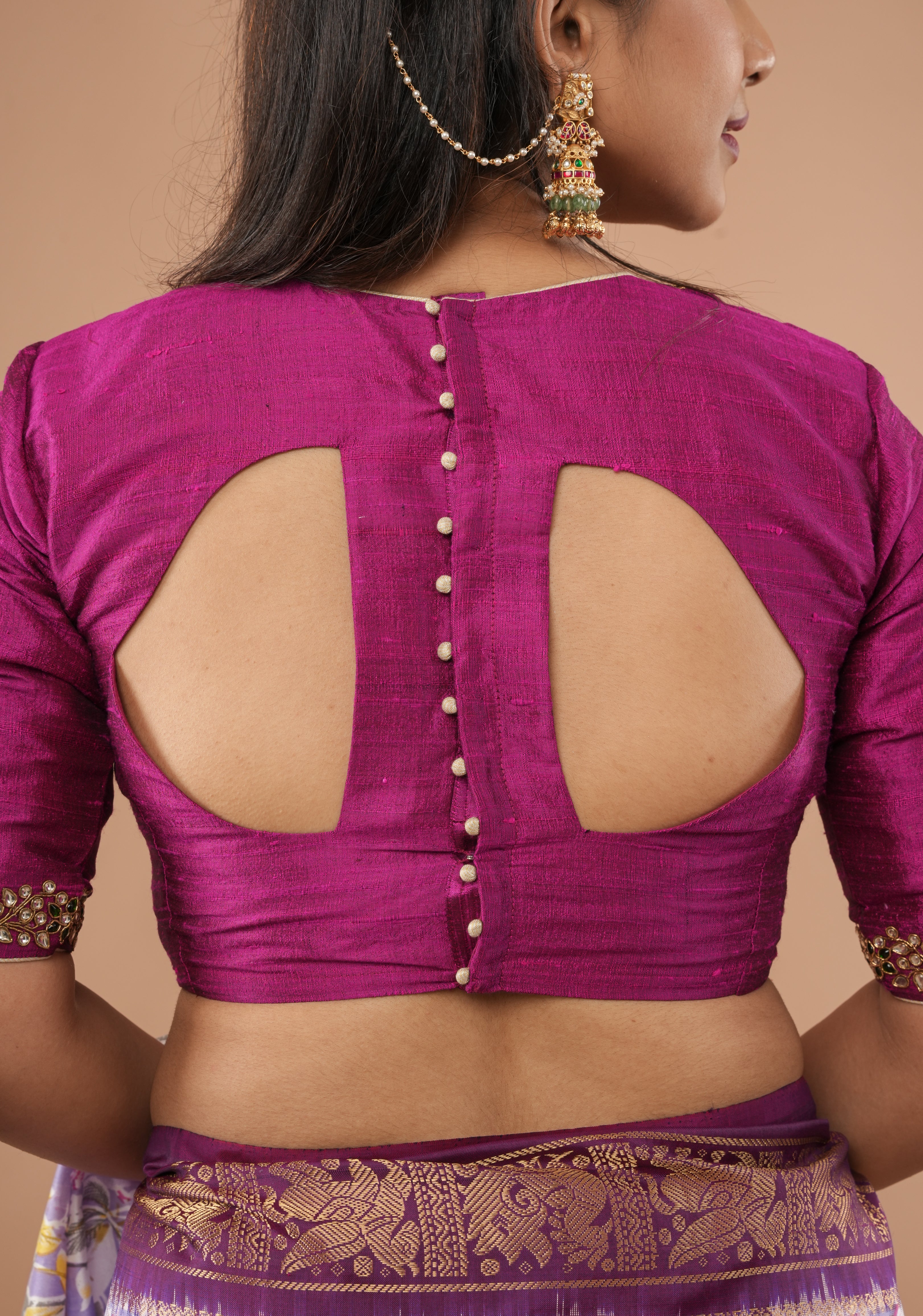 Fuchsia pure raw silk blouse with Kundan necklace and bajuband handwork and unique back cutout | Made to Order