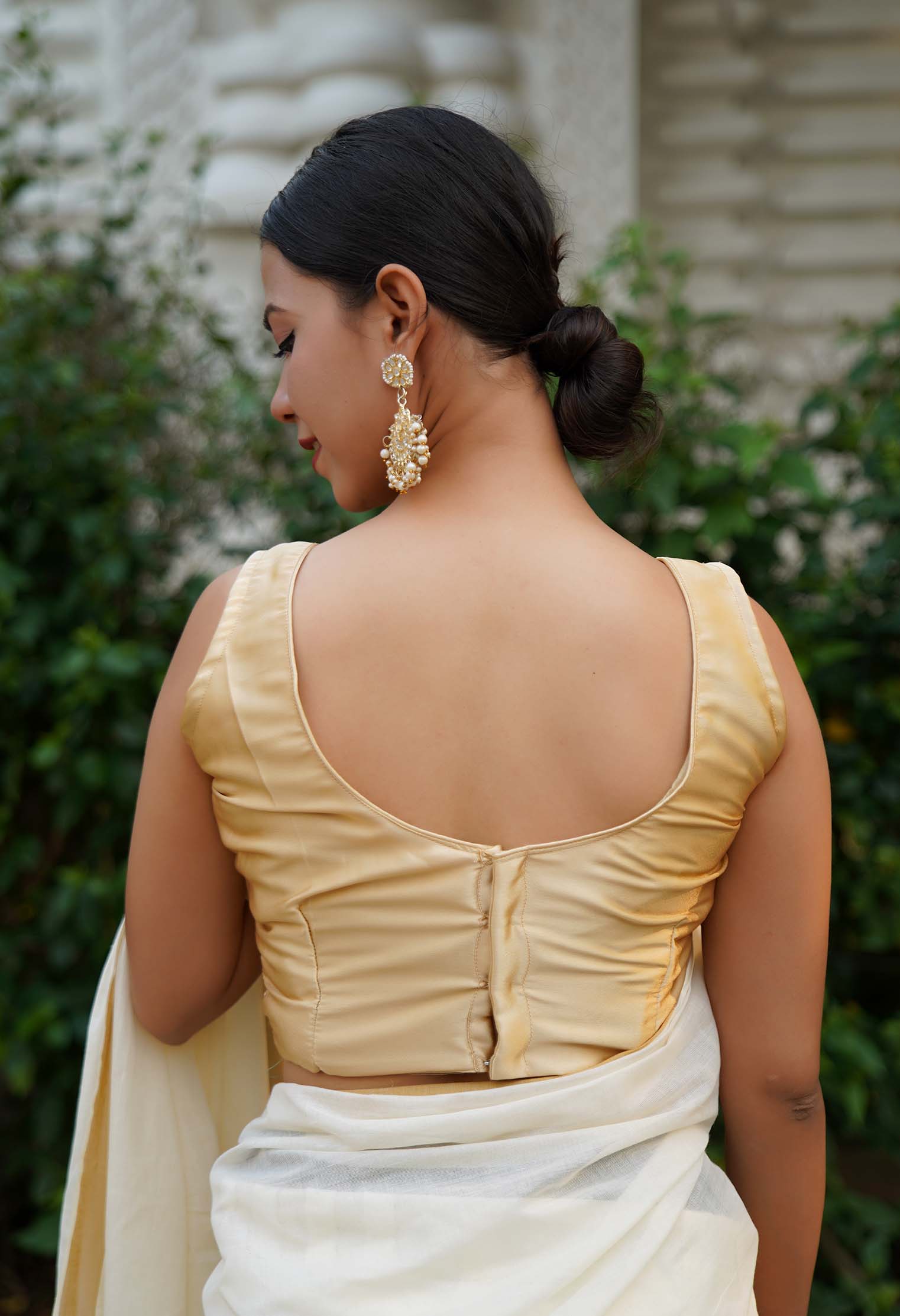 Golden U Neck With Beautiful Back Satin Sleeveless Blouse