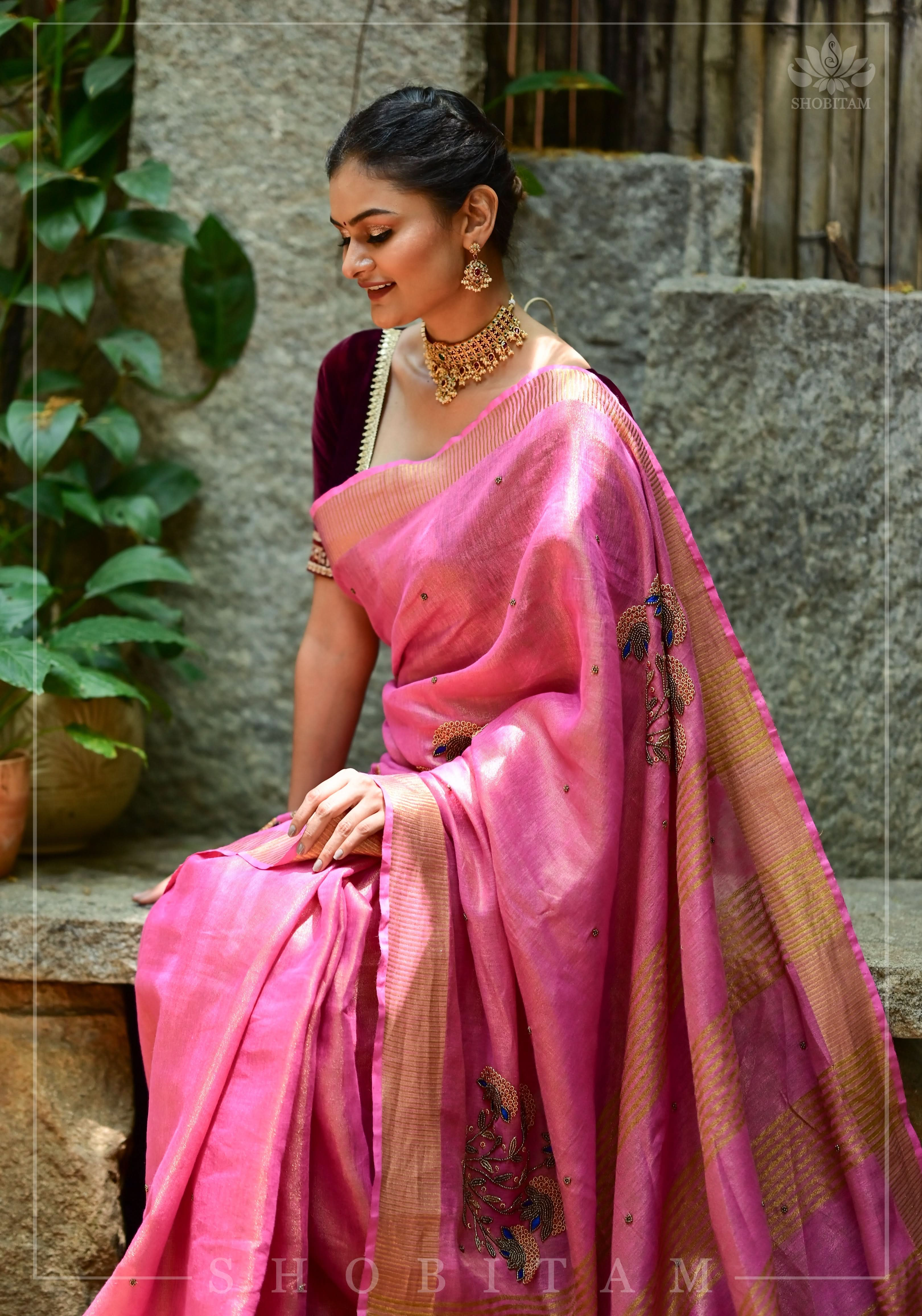 Bead and embroidery handwork on Tissue Linen Saree in Pink and Gold Tissue