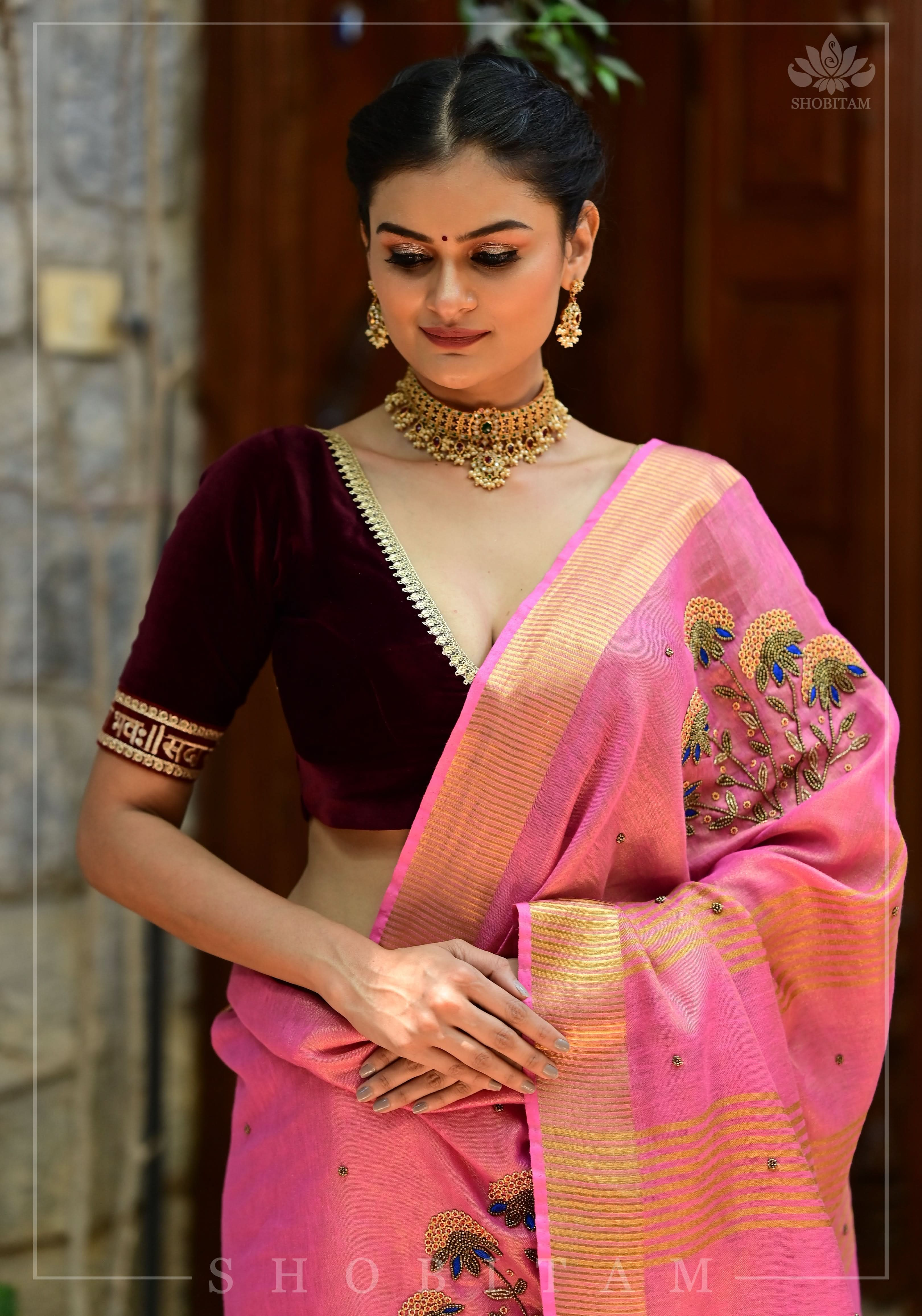 Bead and embroidery handwork on Tissue Linen Saree in Pink and Gold Tissue