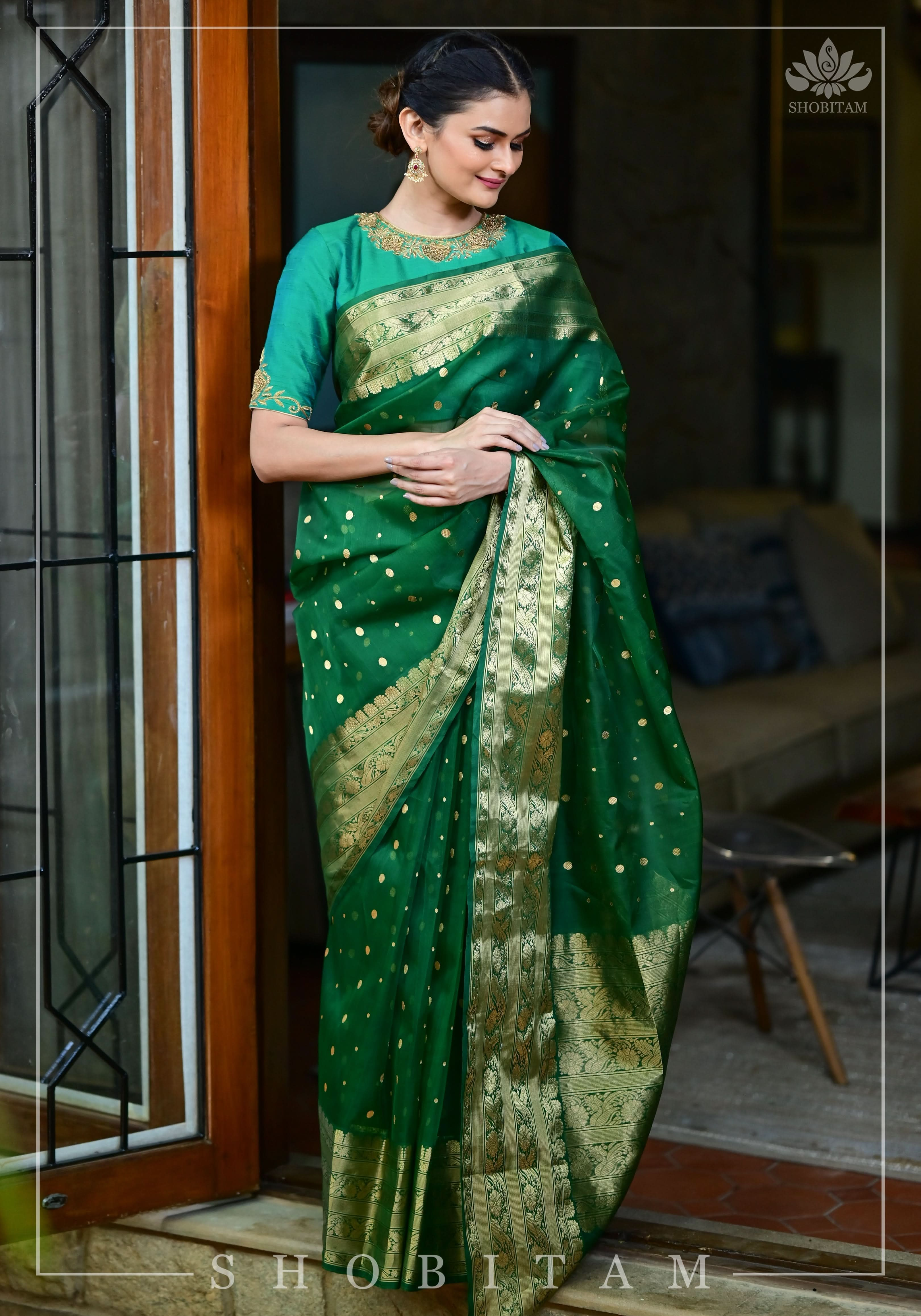 Authentic Emerald Green Chanderi Silk Saree with dense dainty buttas and Wide Zari Buttas. Celebrity Saree