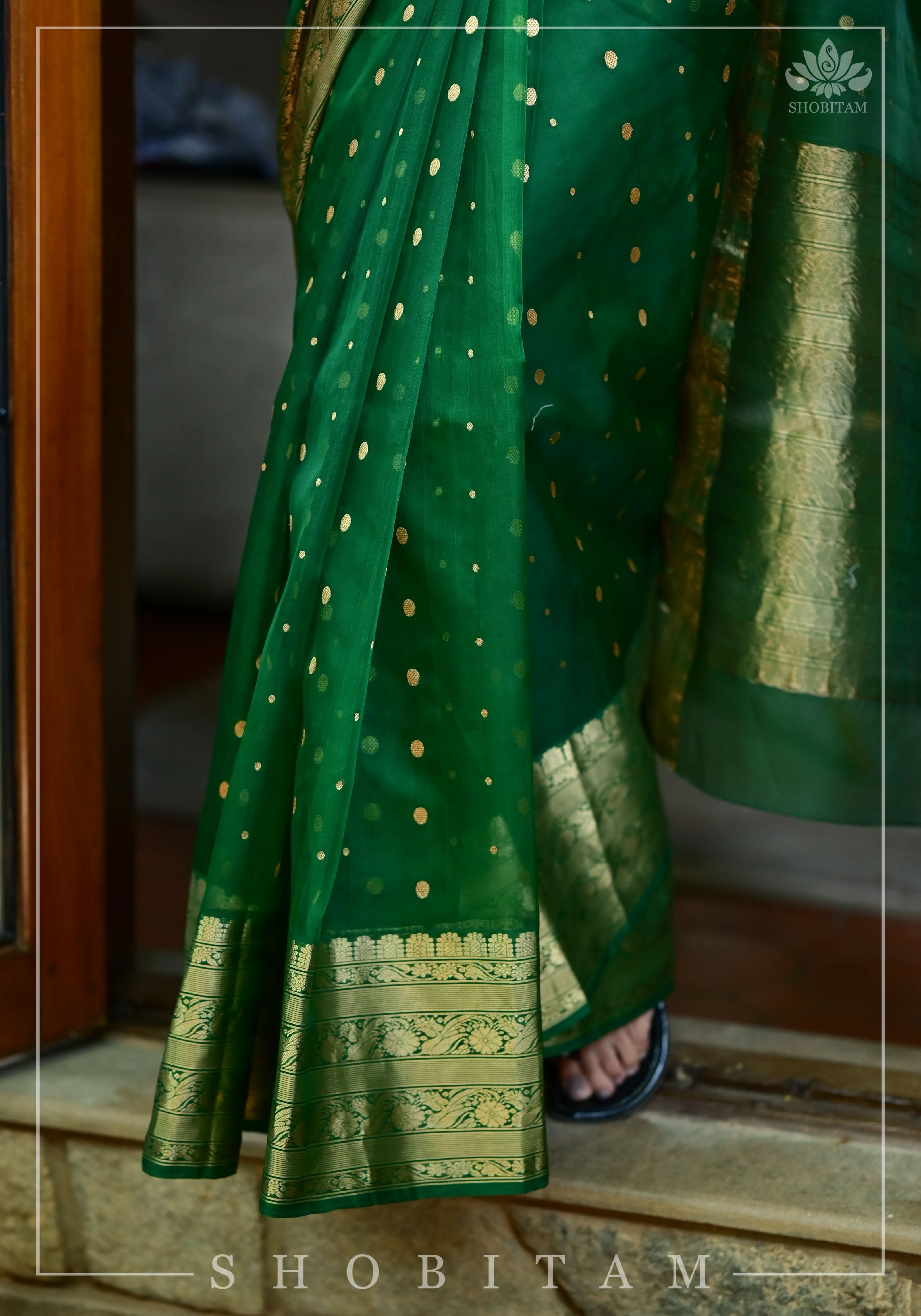 Authentic Emerald Green Chanderi Silk Saree with dense dainty buttas and Wide Zari Buttas. Celebrity Saree