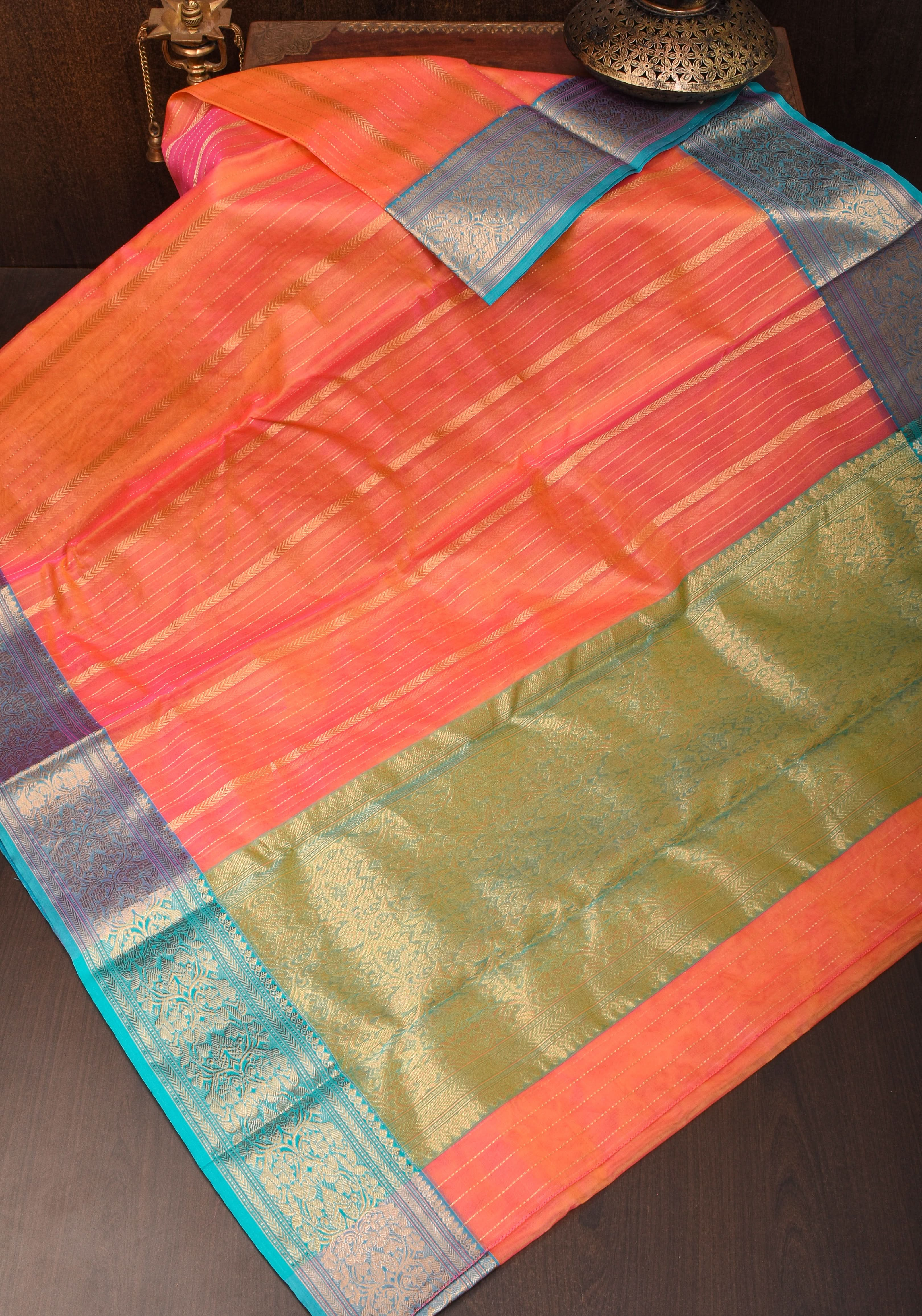 Stunning Striped Chanderi Silk Saree in Orange Dual Tone with Contrast Turquoise Border and Zari