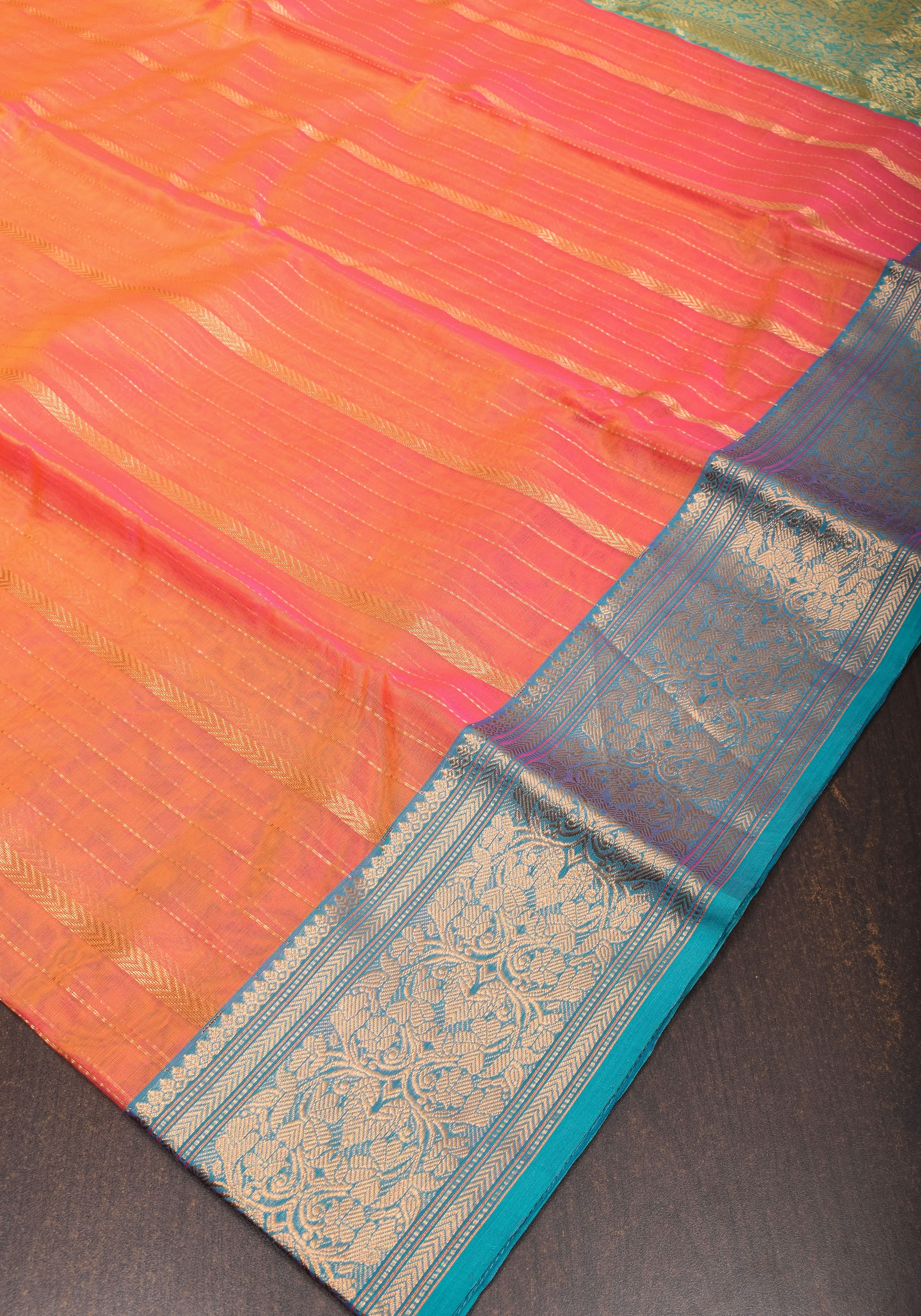 Stunning Striped Chanderi Silk Saree in Orange Dual Tone with Contrast Turquoise Border and Zari