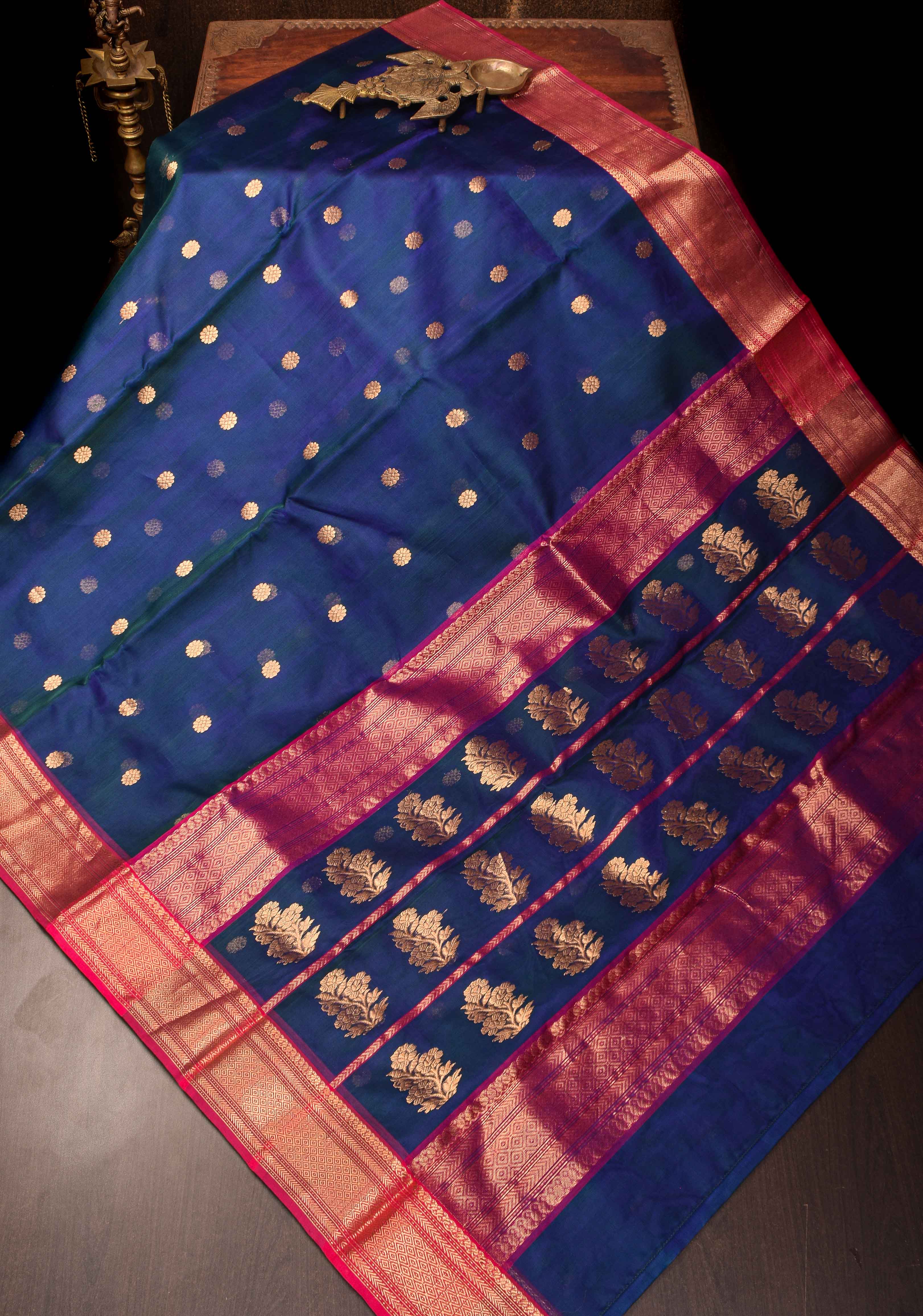 Exquisite Chanderi Silk Saree in Peacock Blue Dual tone with Zari Buttas and Zari Borders