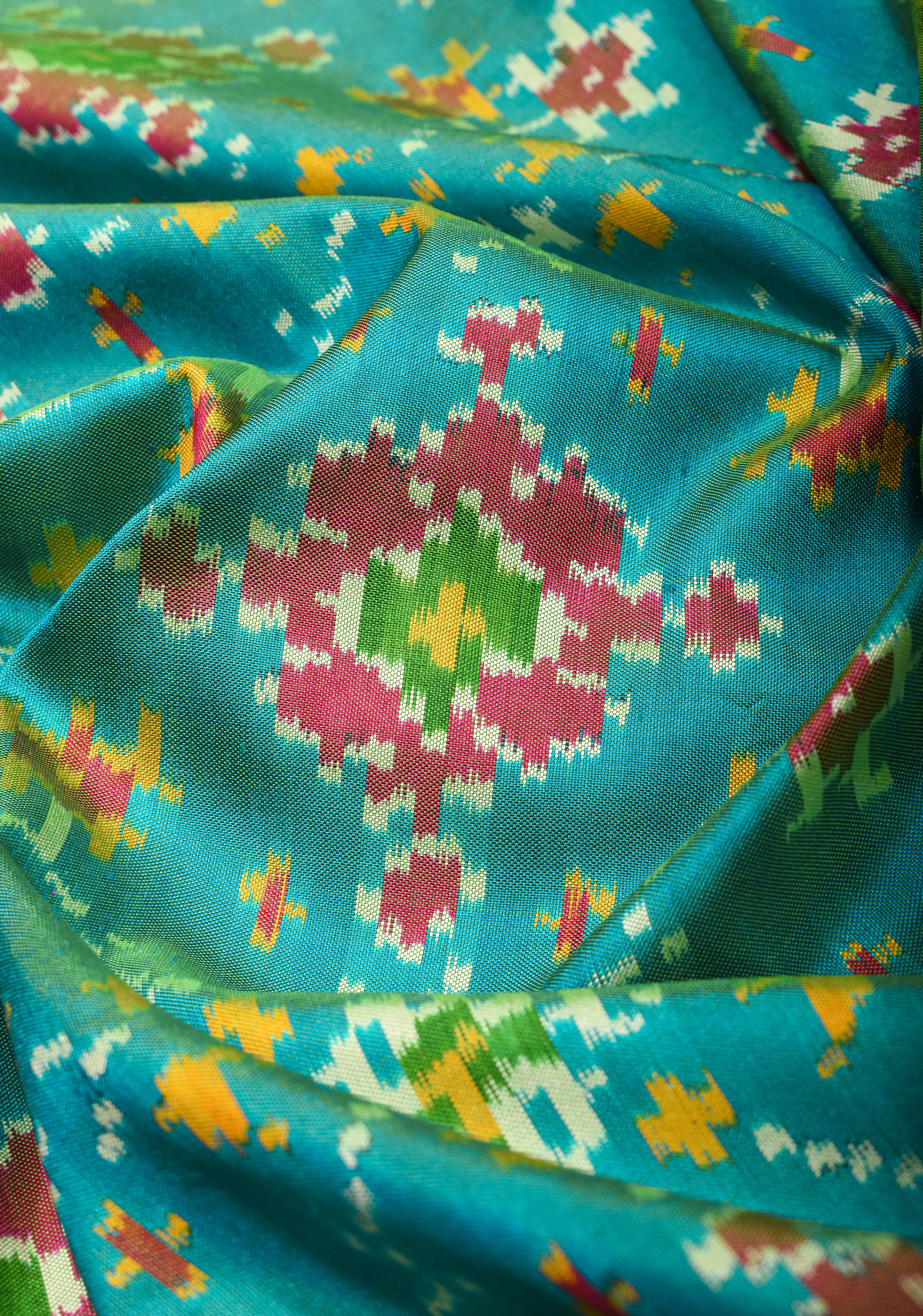 Ikkat Patola  Kanjivaram Fusion Silk Saree in Turquoise Blue & Mustard dual tone with Wide Kanjivaram border | SILK MARK CERTIFIED