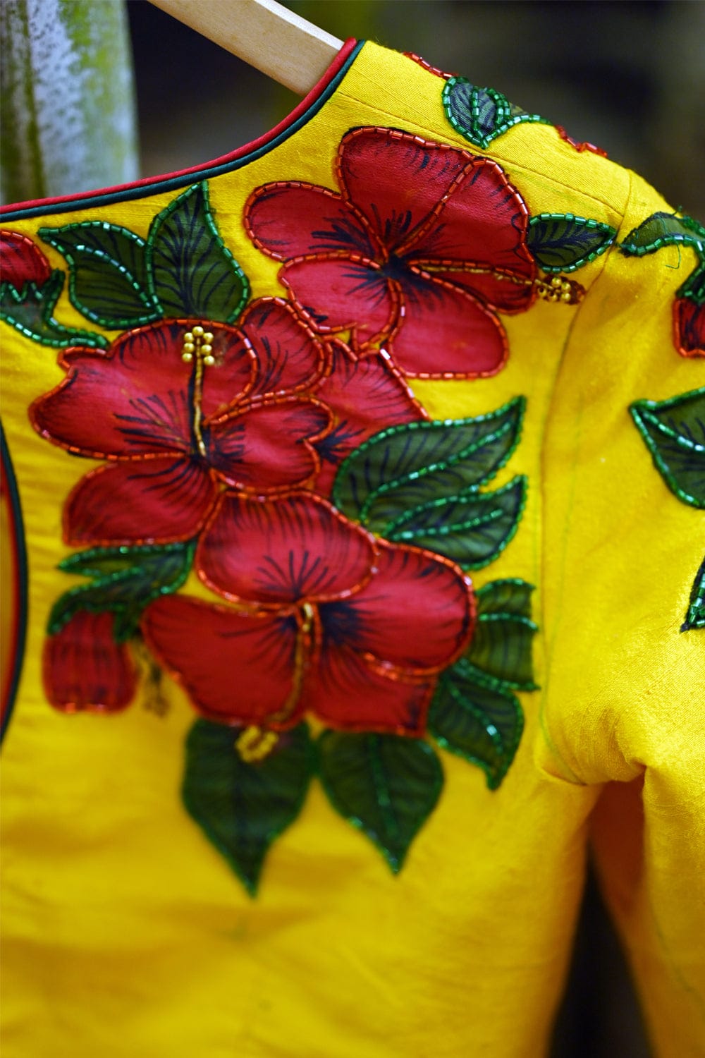 Yellow blouse with store flowers