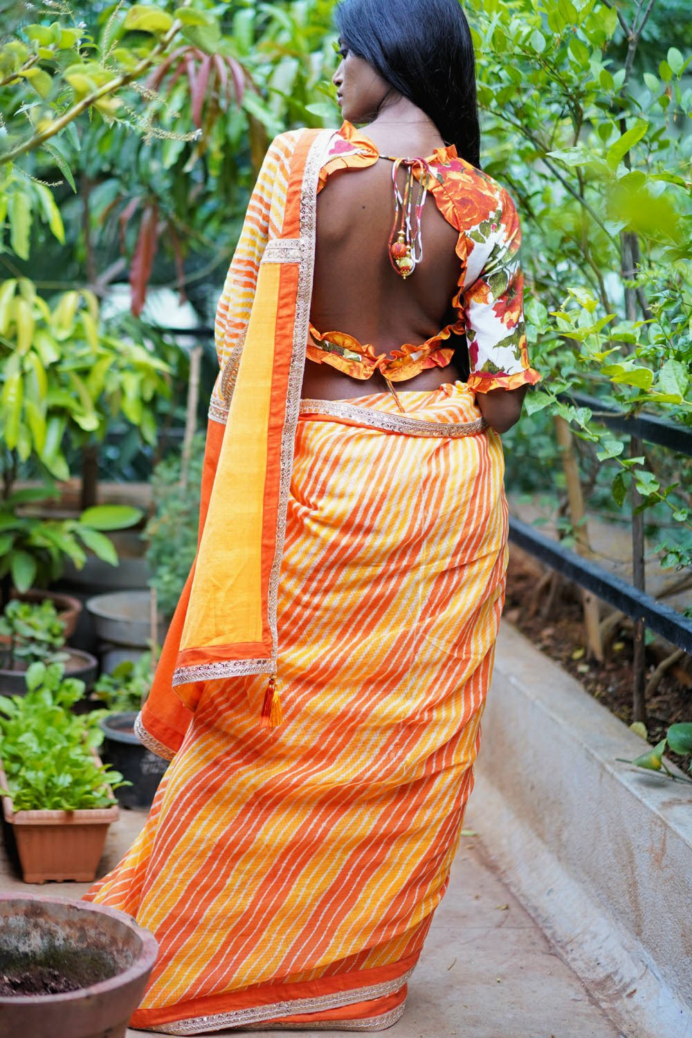 Ruby pink handloom cotton and mustard floral kalamkari frill V neck bl