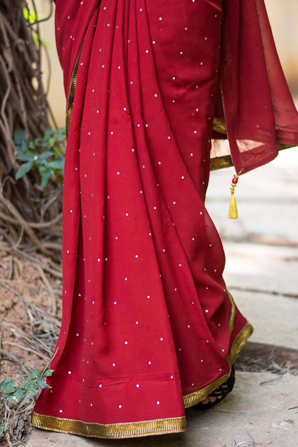 red color viscose georgette saree with zari weaving work